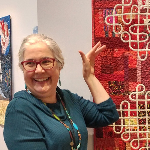 Quilt display at Smithsonian in the S. Dillon Ripley Center (February 2020)